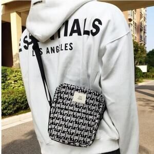 Essentials fear of god sling unisex belt bag crossbody fanny pack black white